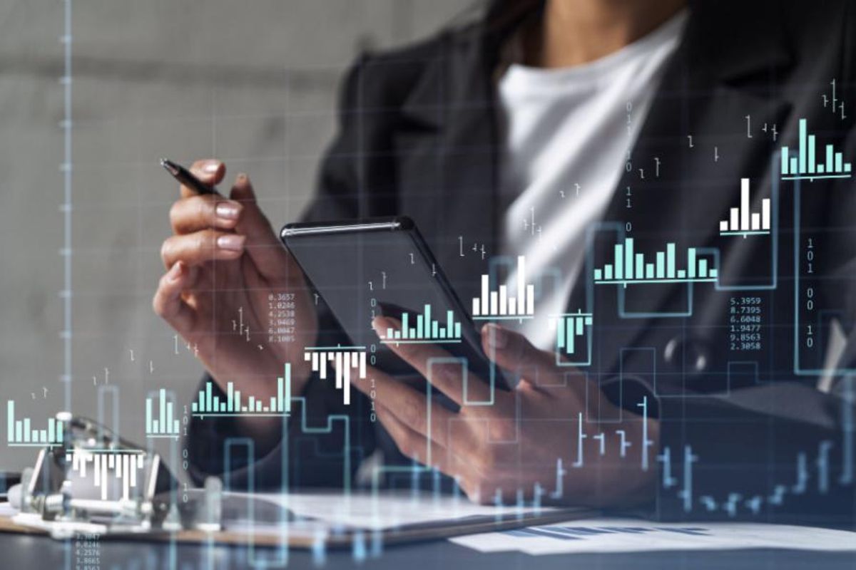 investor with stock charts