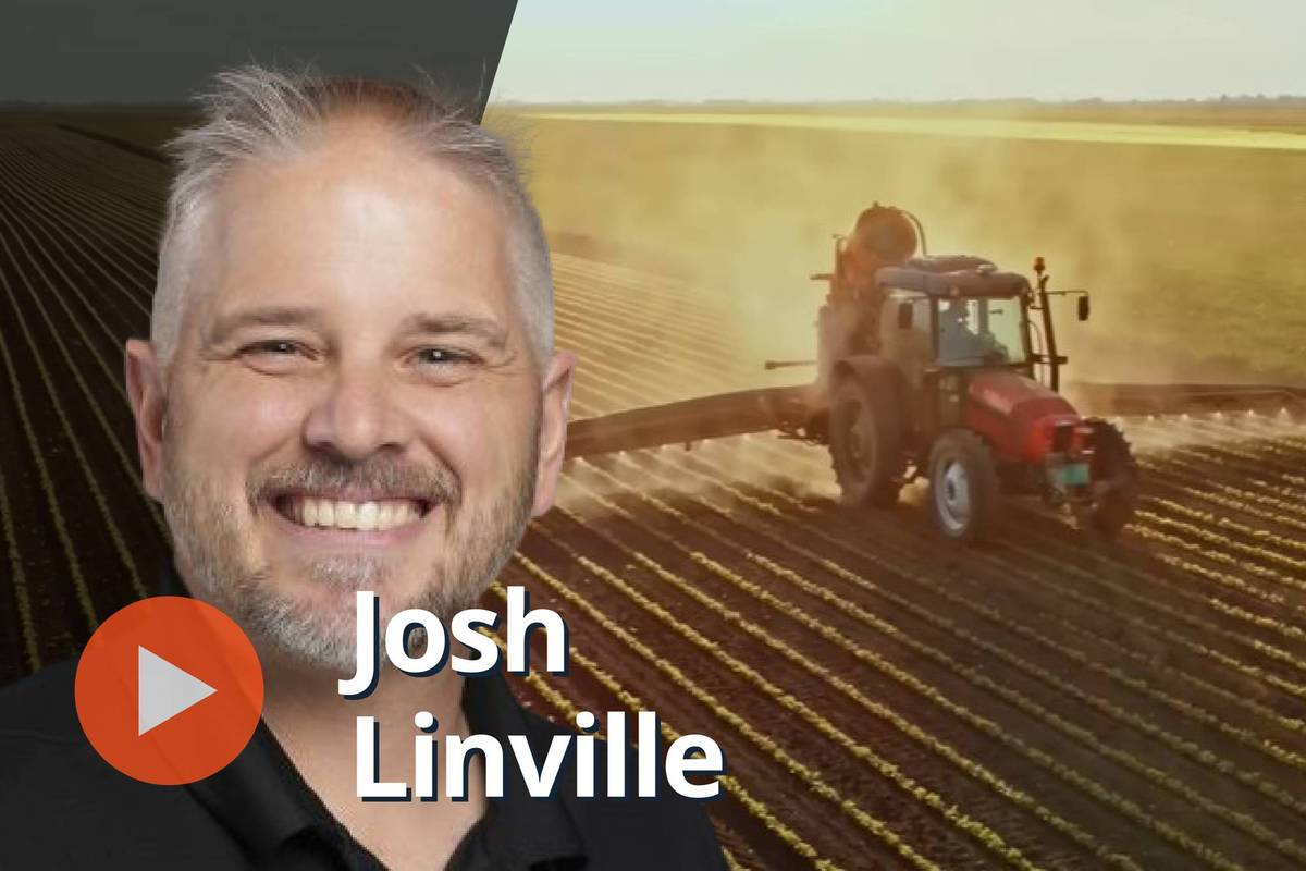 Josh Linville, tractor in field.