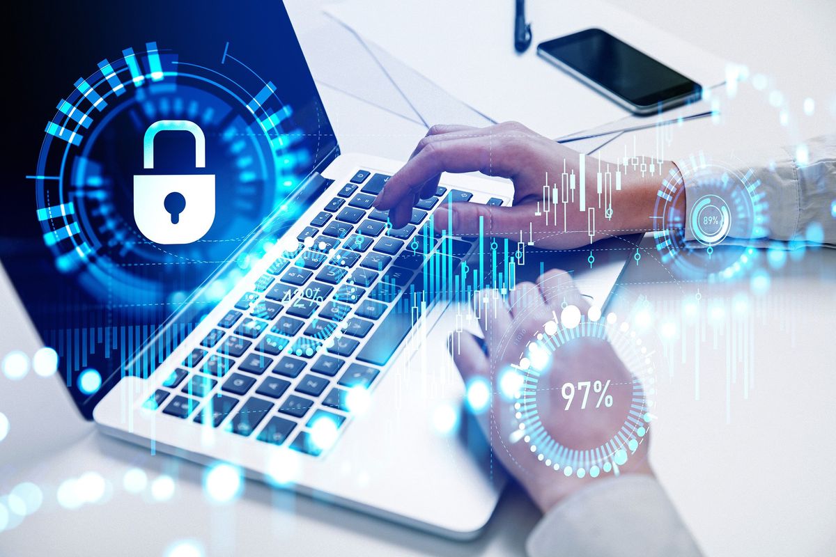 laptop with security icon on screen