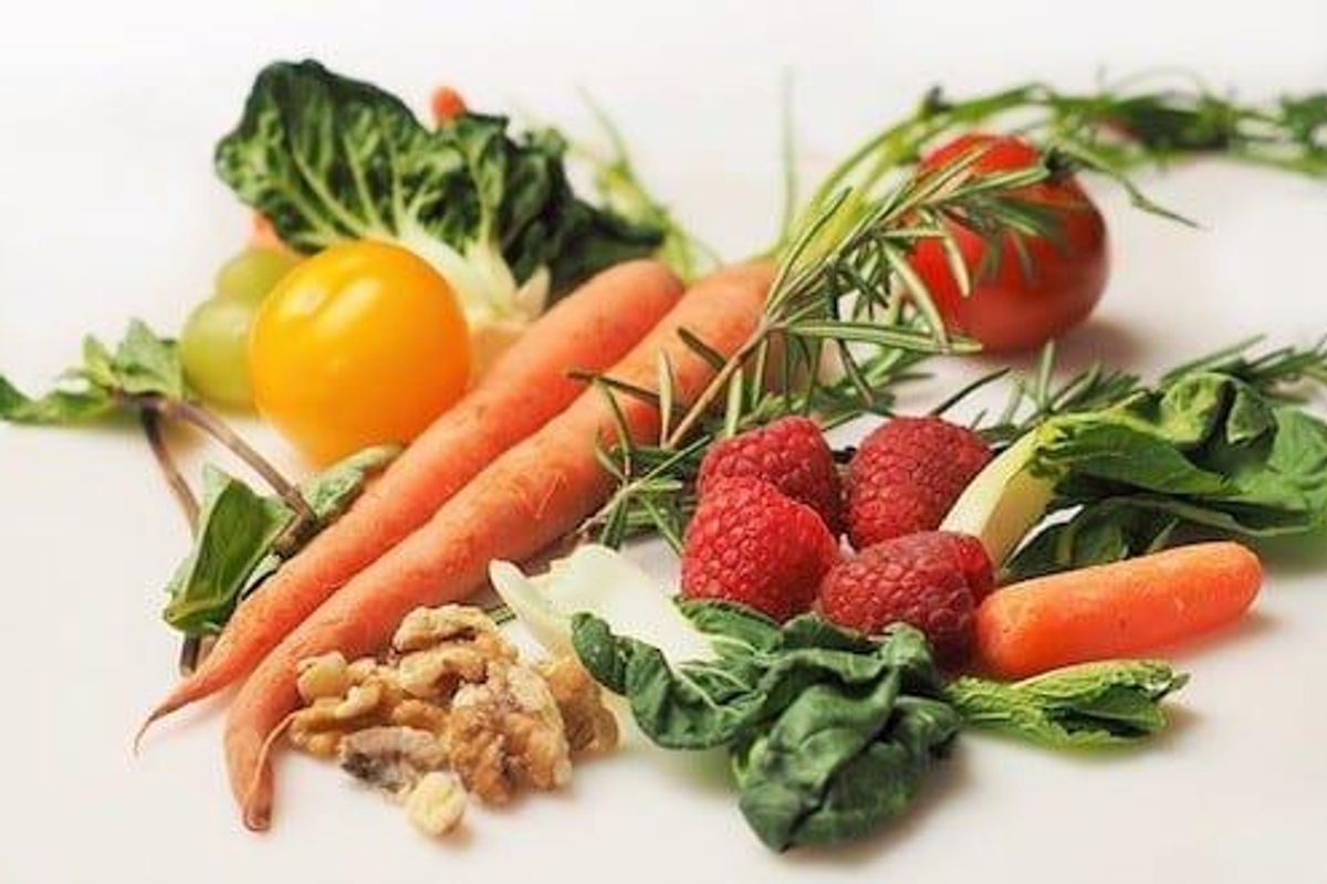 leafy greens, carrots, tomatoes, grapes, raspberries, rosemary and walnuts