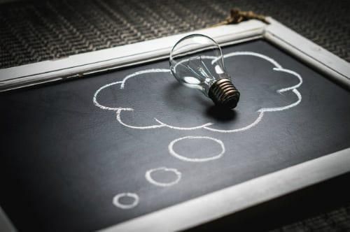 lightbulb on chalkboard