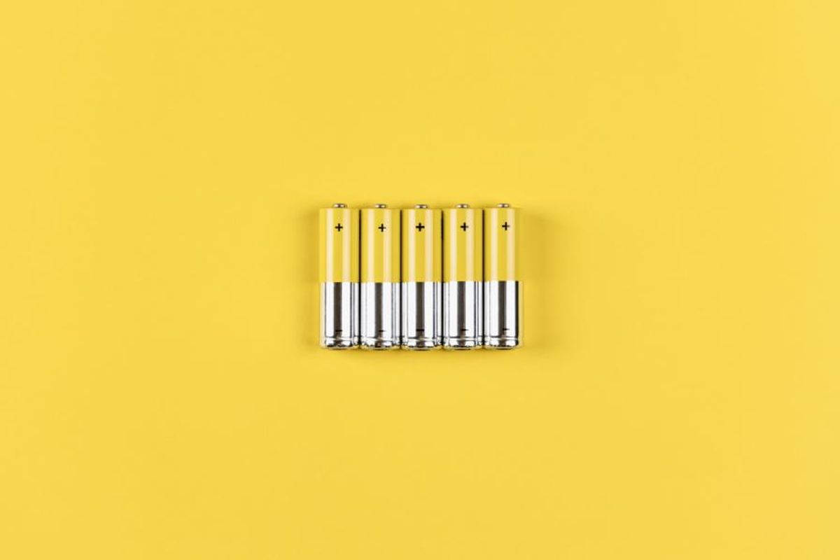 lithium-ion batteries on yellow background