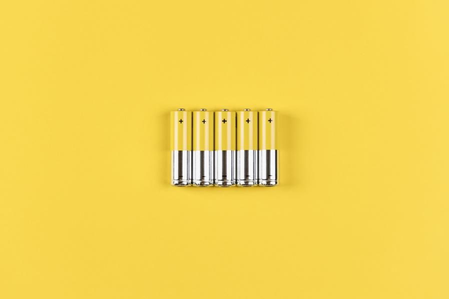 lithium-ion batteries on yellow background