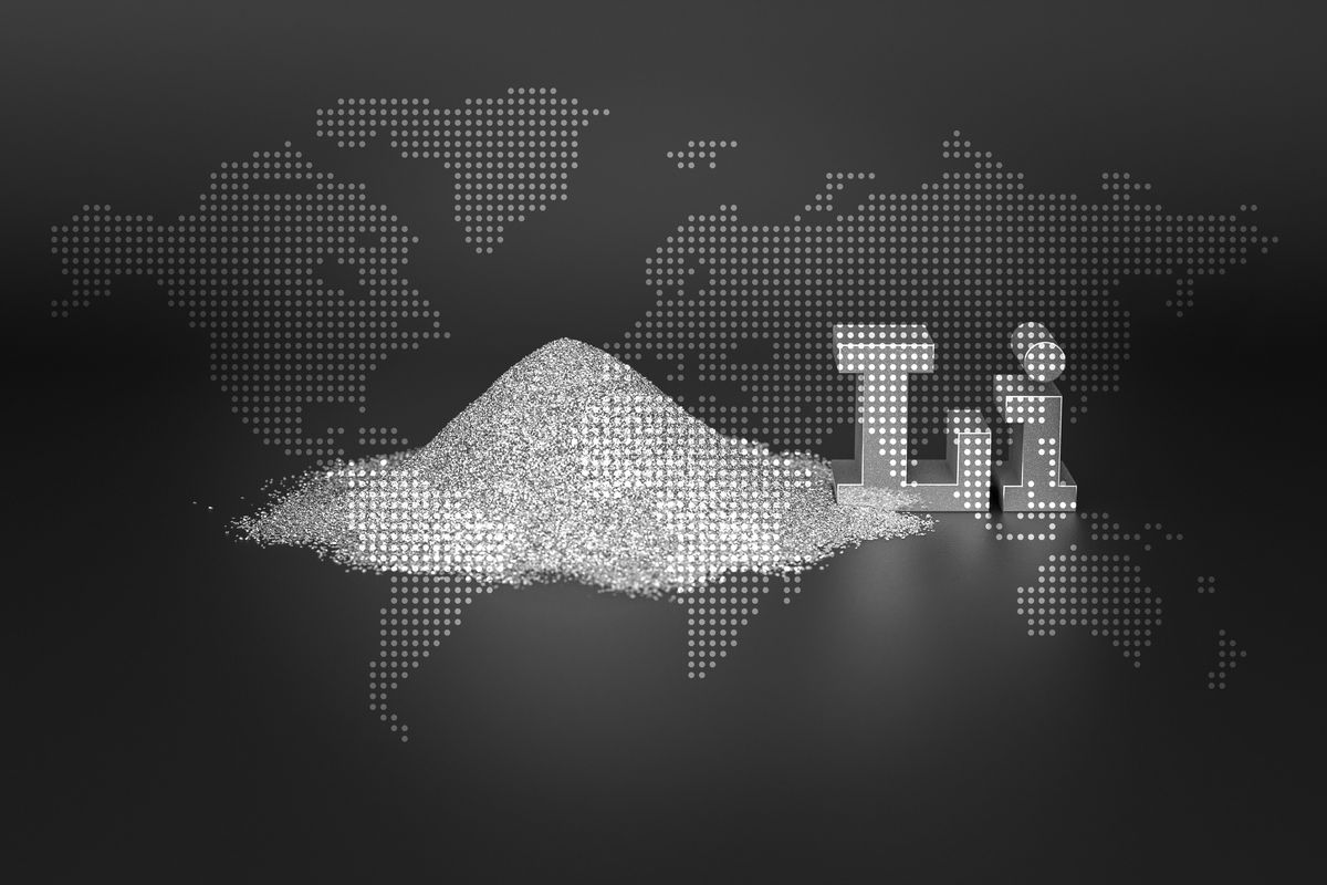 Lithium periodic symbol and powder overlayed with world map.