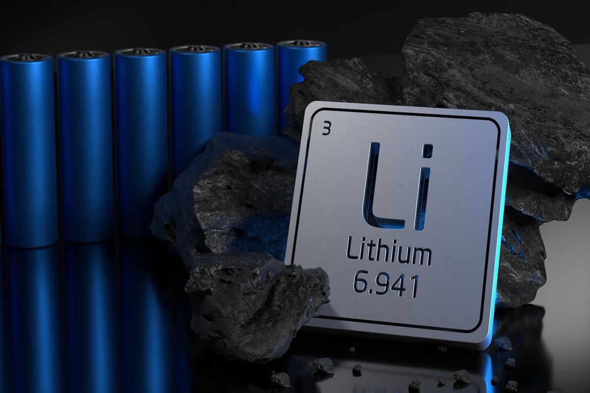 Lithium symbol with batteries and rocks in the background.