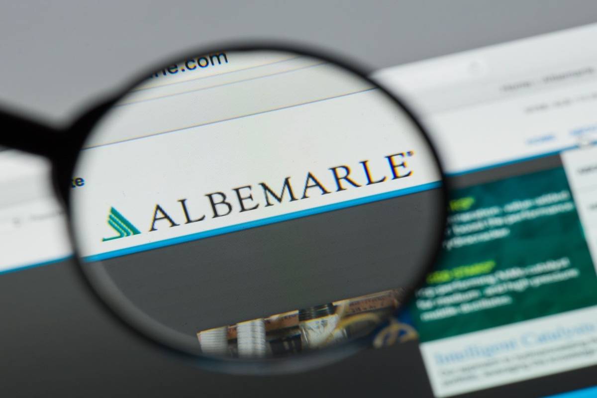 Magnifying glass focusing on the Albemarle website logo.