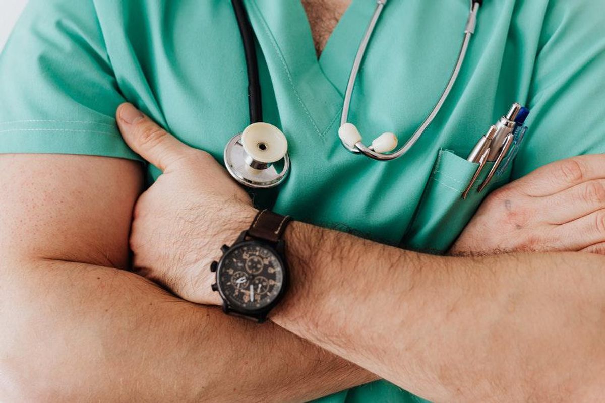male doctor wearing scrubs