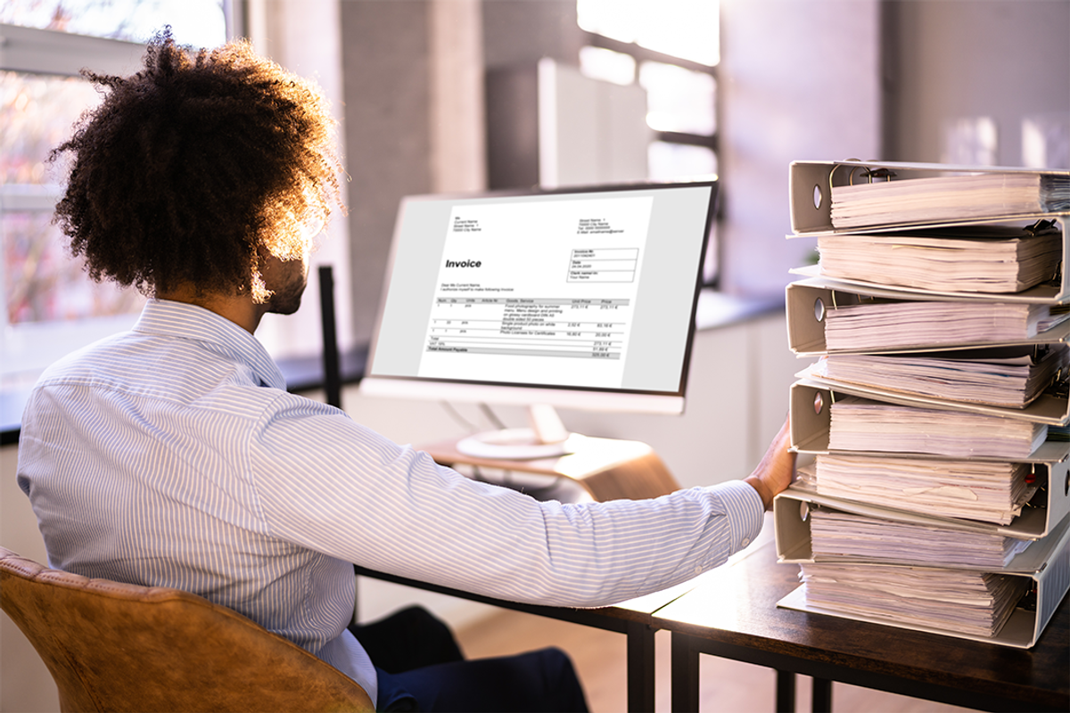 Man working at desk.
