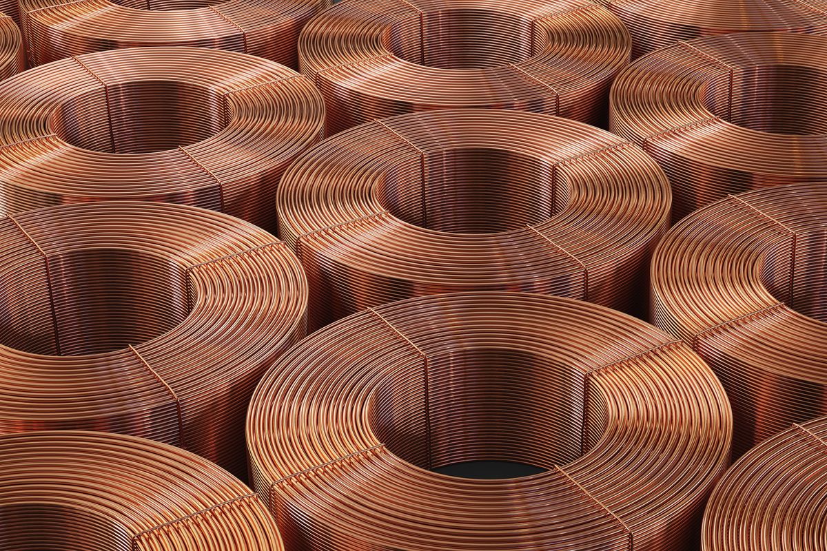 Many copper bobbins and warehouse copper pipes.