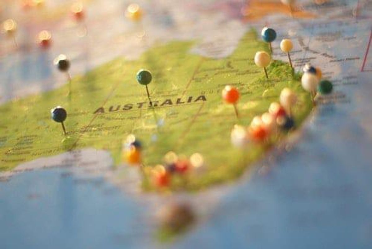 Map of Australia with pins sticking out. 