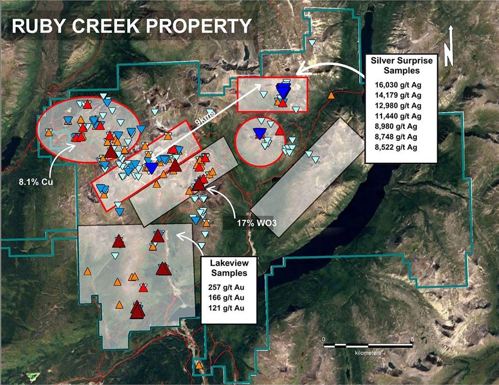 Map of Eranova Metal's RUBY CREEK PROPERTY" showing colored triangles, circles, arrows, and sample data over a landscape background.