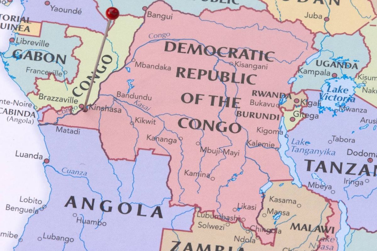 Map shows Central African countries with a red pin over Brazzaville; text reads: Democratic Republic of the Congo.