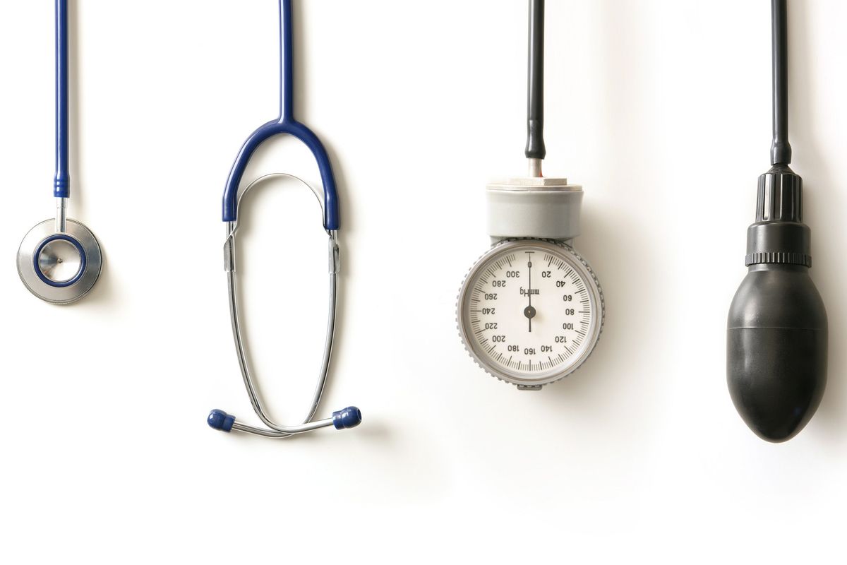 Medical devices over a white background.