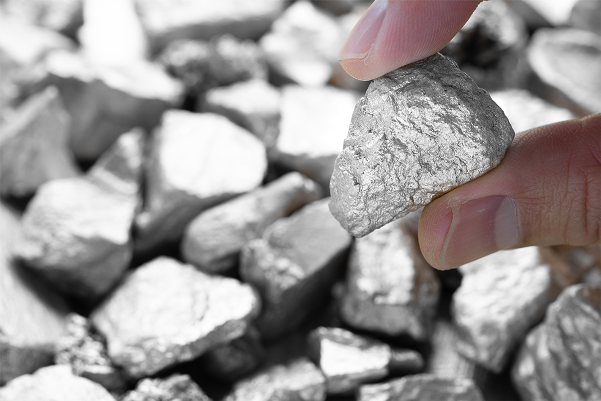Miner holding silver.