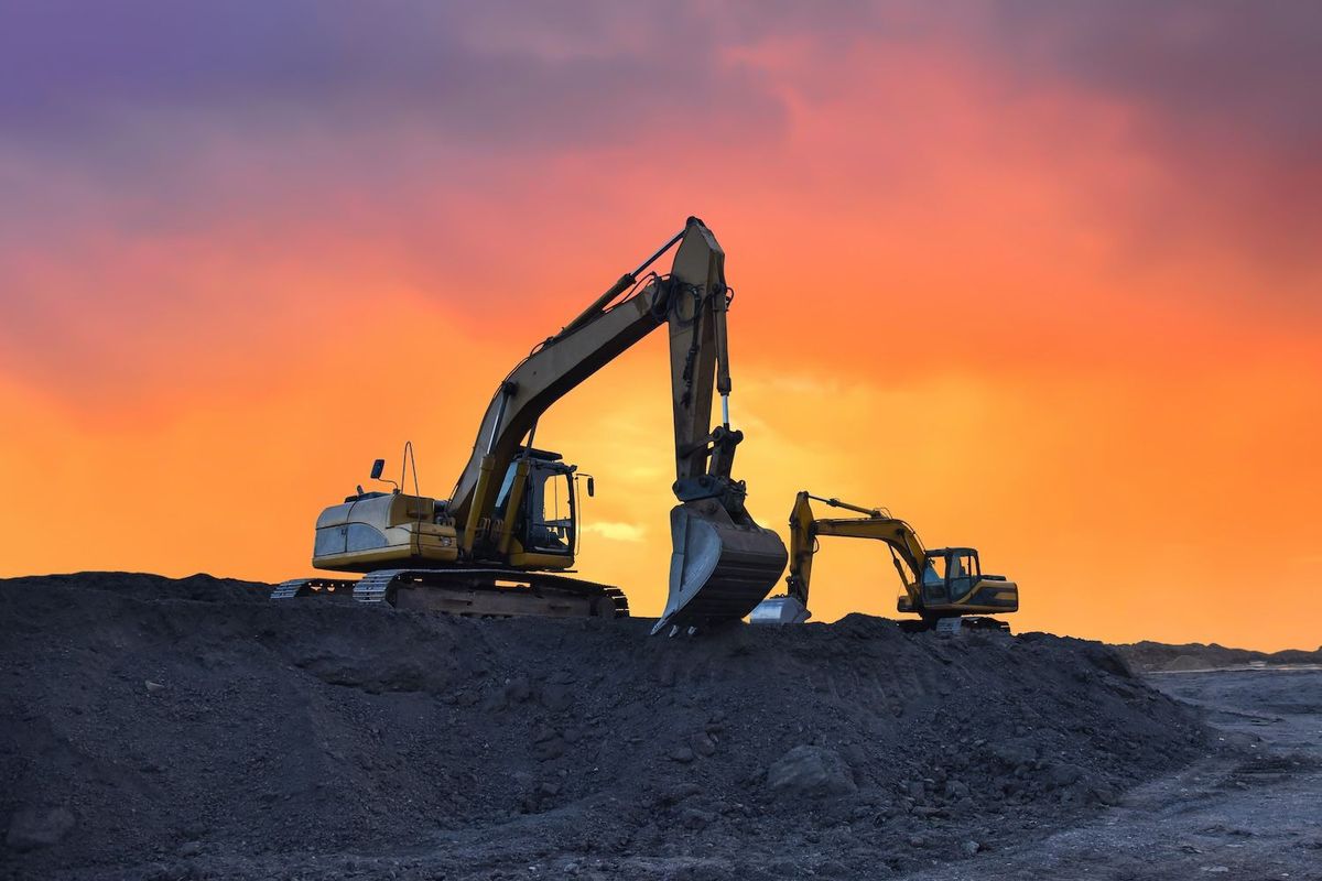 Mining excavator moving dirt.