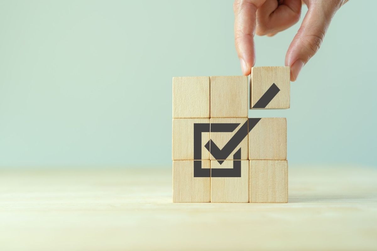 Nine blocks form a check mark.