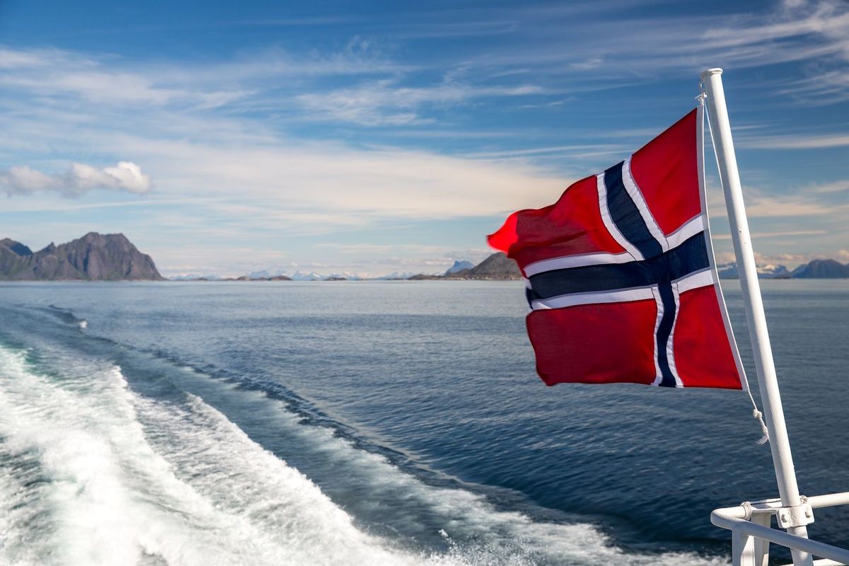 Norwegian flag on the back of boat.