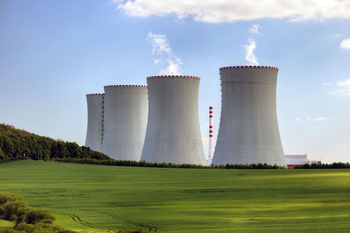 Nuclear reactors in green field.