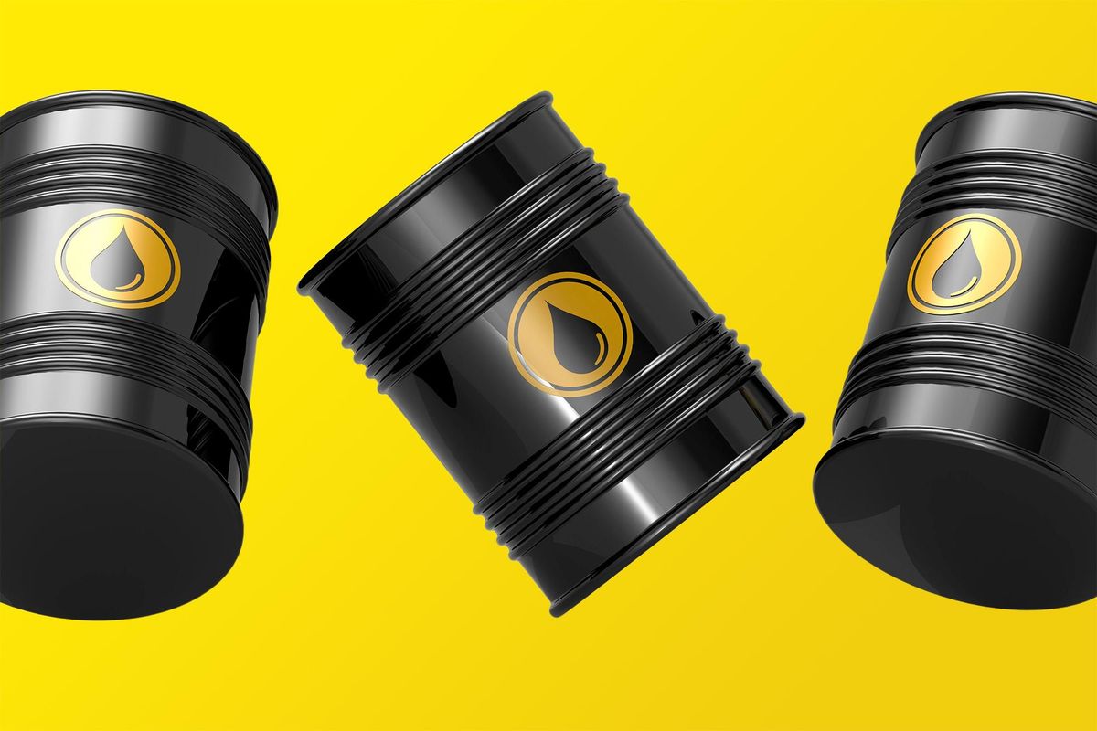 oil barrels over yellow background