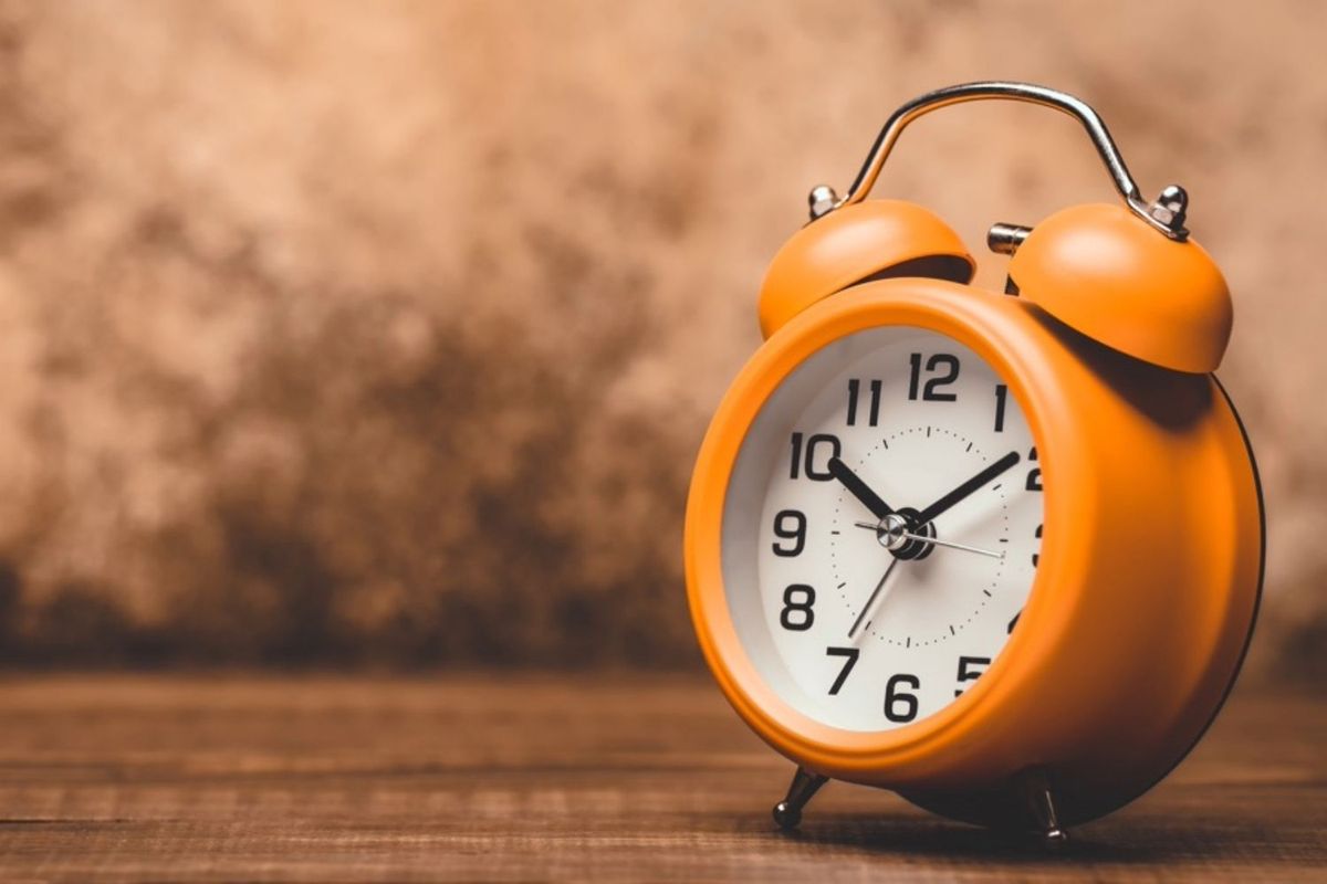 Orange alarm clock.