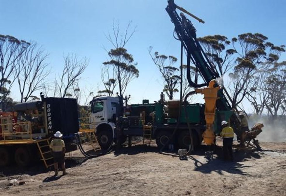 Photo 1: Drill rig commencing Charger\u2019s maiden drill programme into the Medcalf Spodumene Prospect.