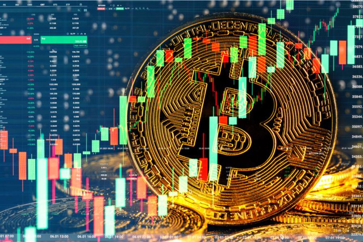 physical bitcoin coin amid stock chart graphics