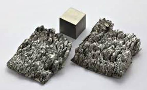 pieces of scandium on a white surface