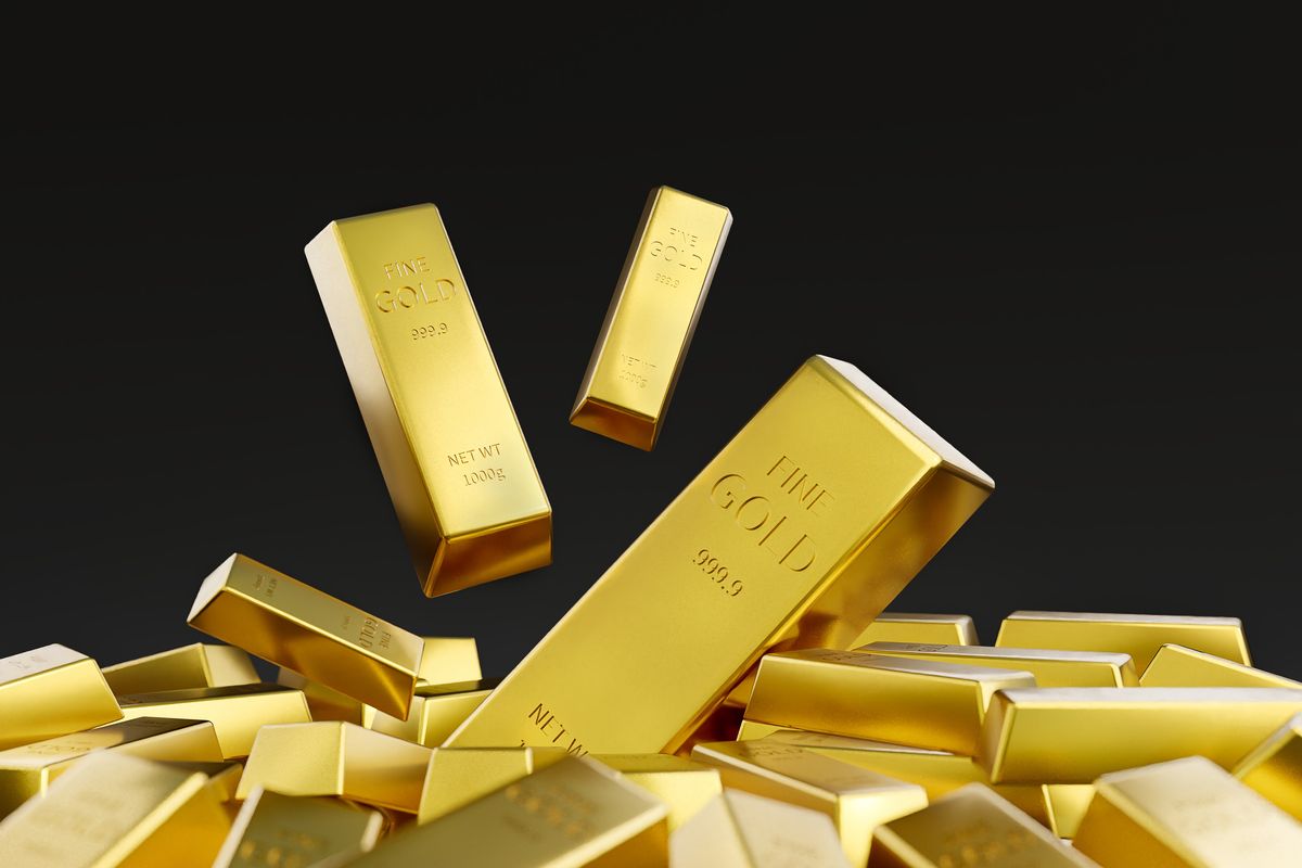 Pile of gold bars over black background.