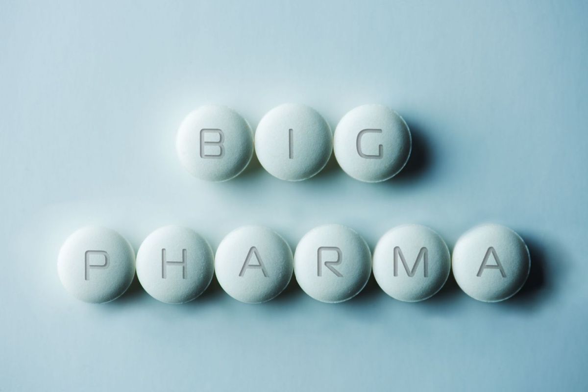Pill spelling "big pharma."