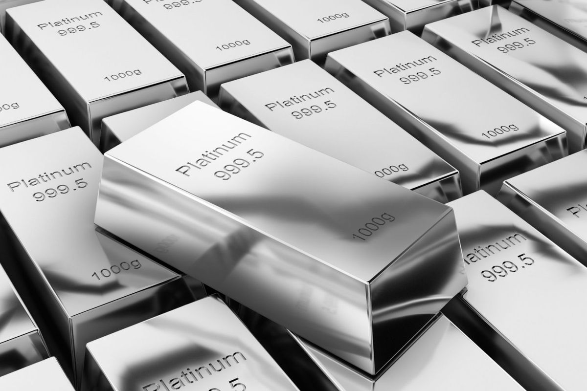 Platinum bullion bars in a grid pattern with one bar on top.