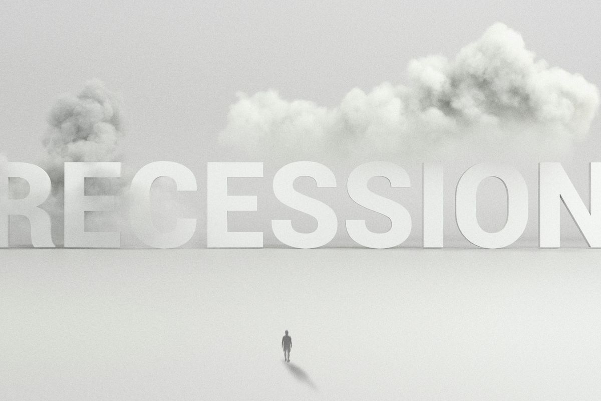 "Recession" written with smoke clouds.