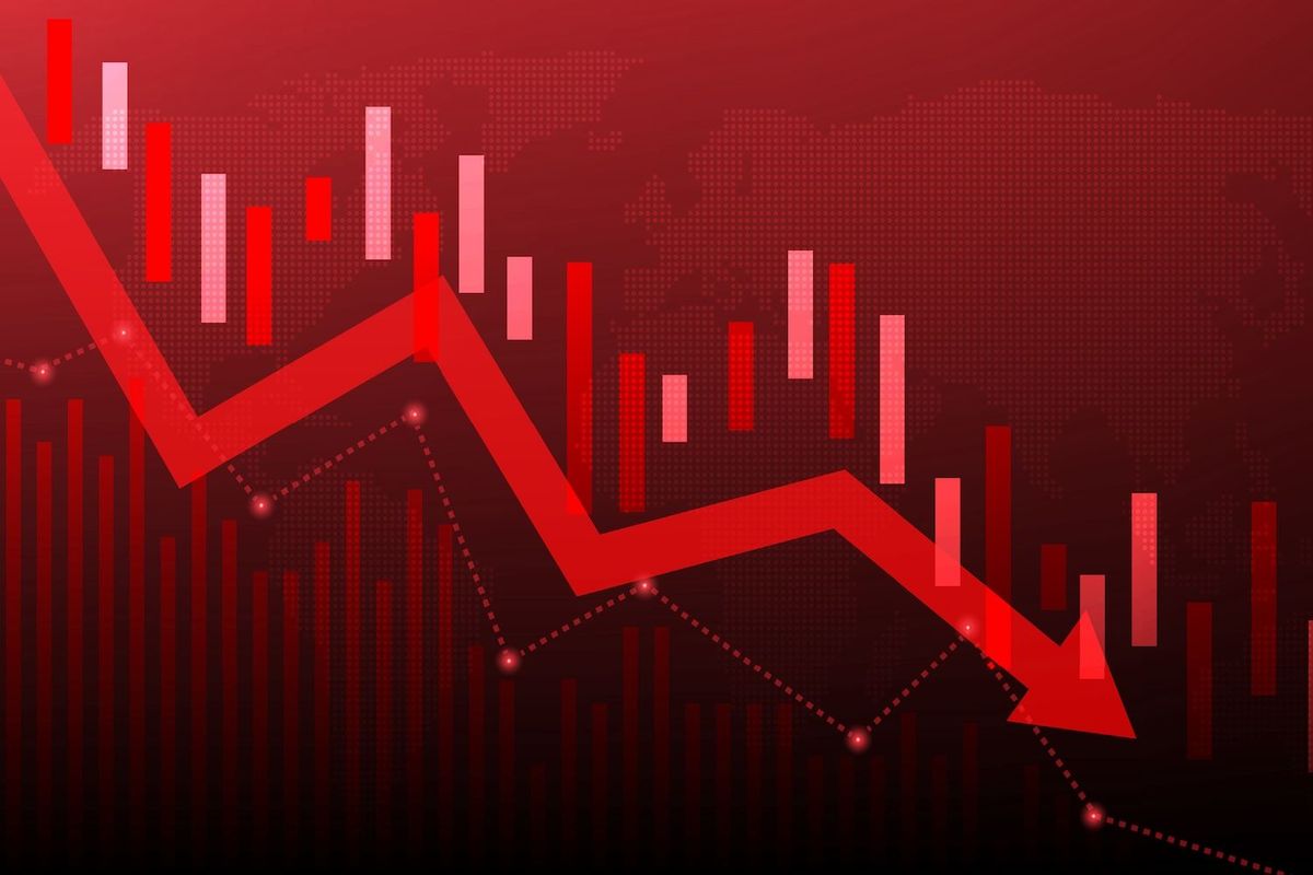Red downward graph arrow indicating declining financial data.