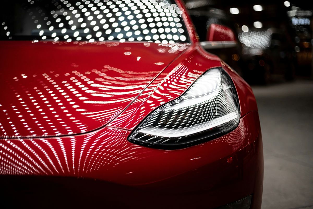 Red Tesla car. 