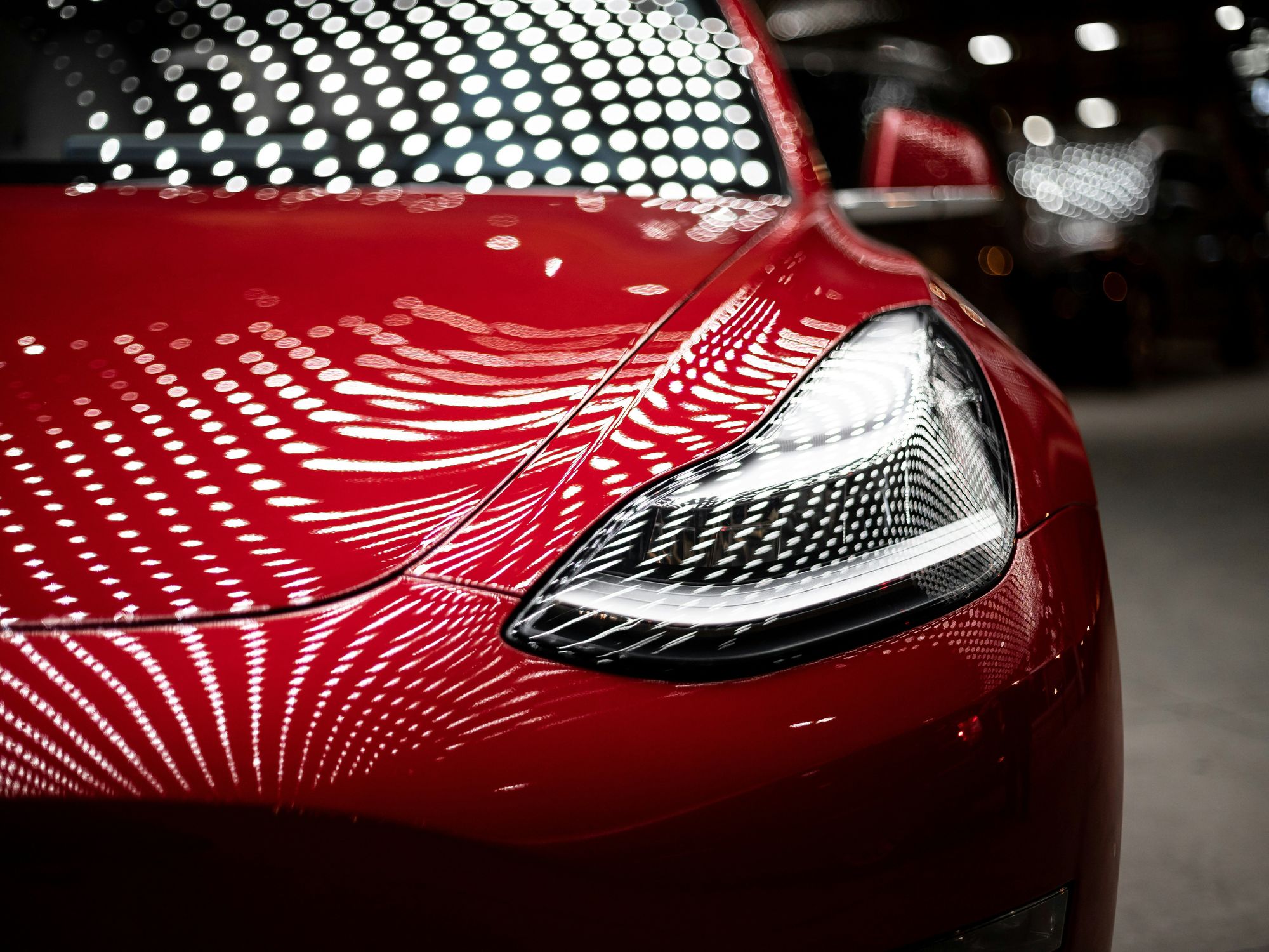 Red Tesla car.