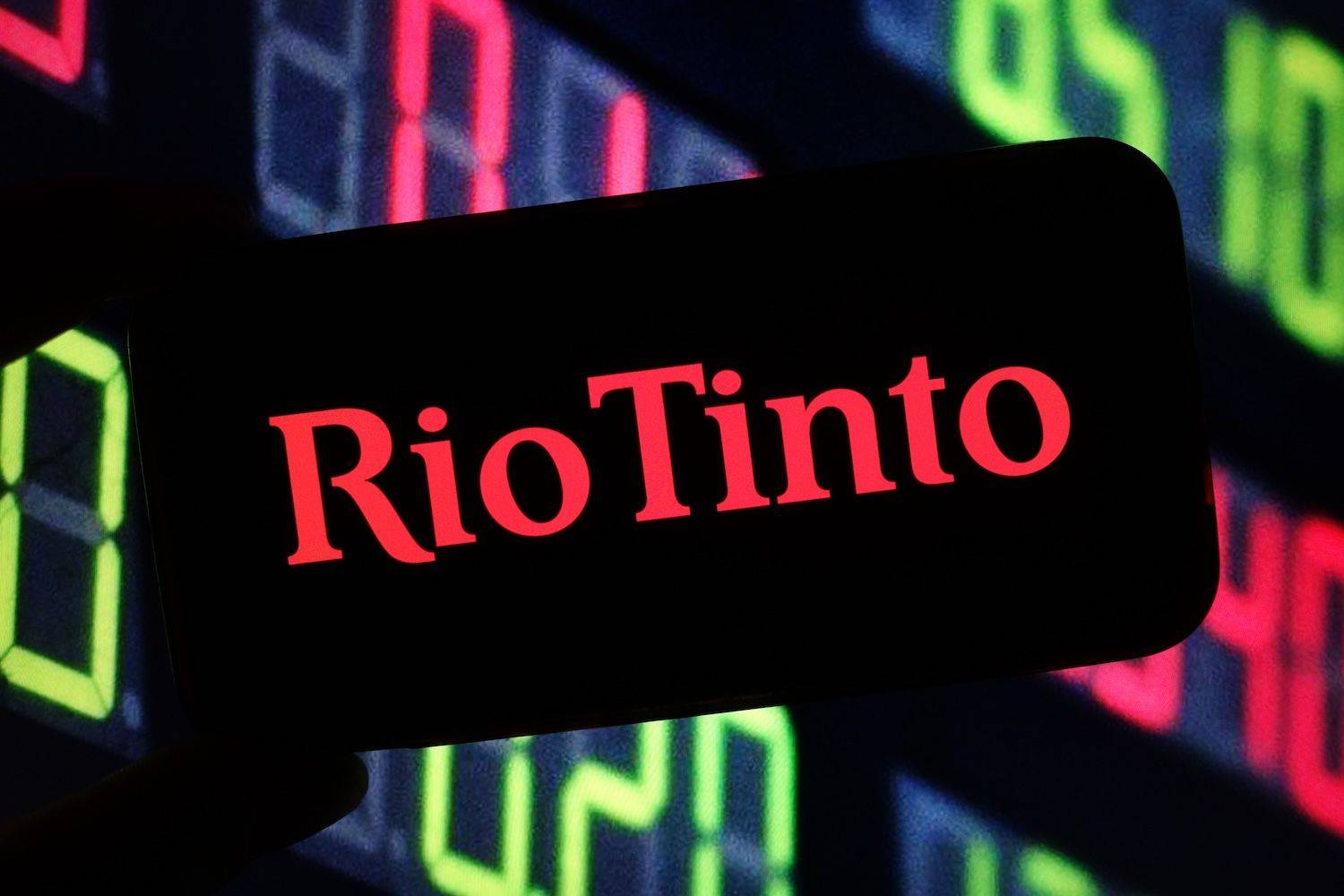 "Rio Tinto" written on a phone screen.