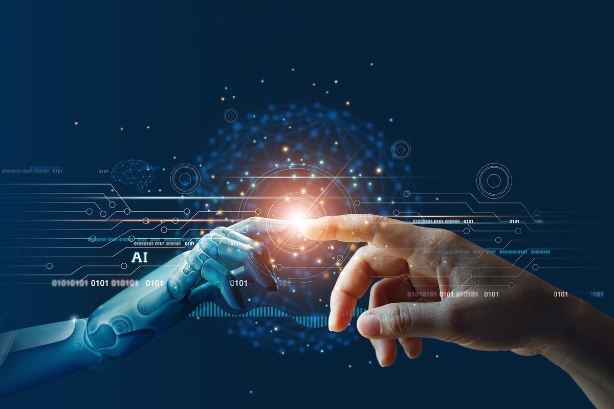 Robot hand touching human hand with a spark in between.