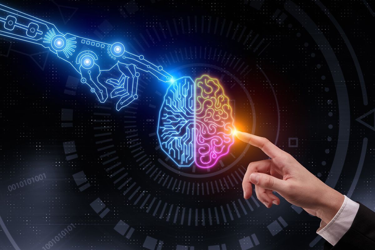 Robotic hand and human hand reaching out to touch glowing brain.