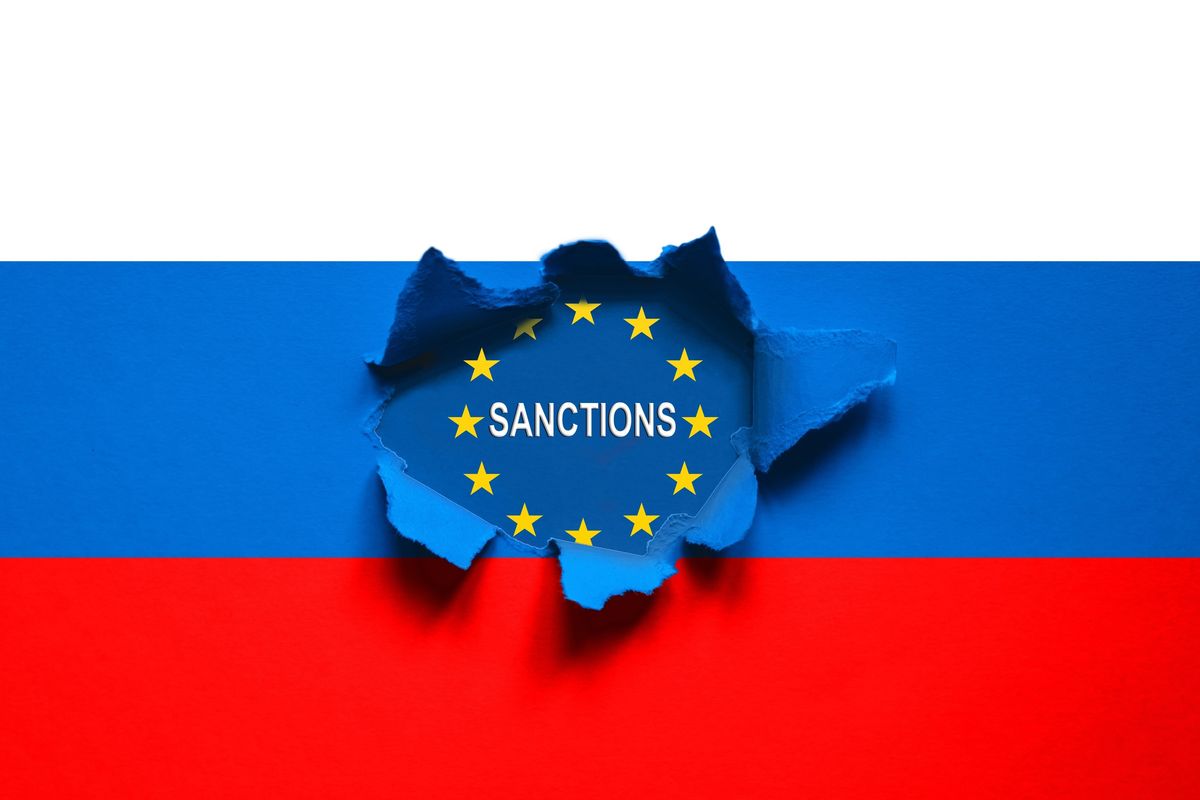 Russian flag with "sanctions" written in the middle encompassed by the EU flag.