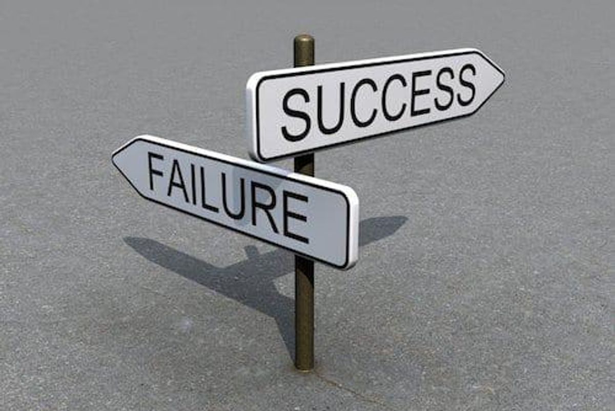 signs saying "success" and "failure"