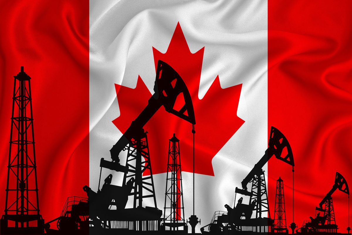 Silhouette of drilling rigs and oil derricks with Canadian flag in background.