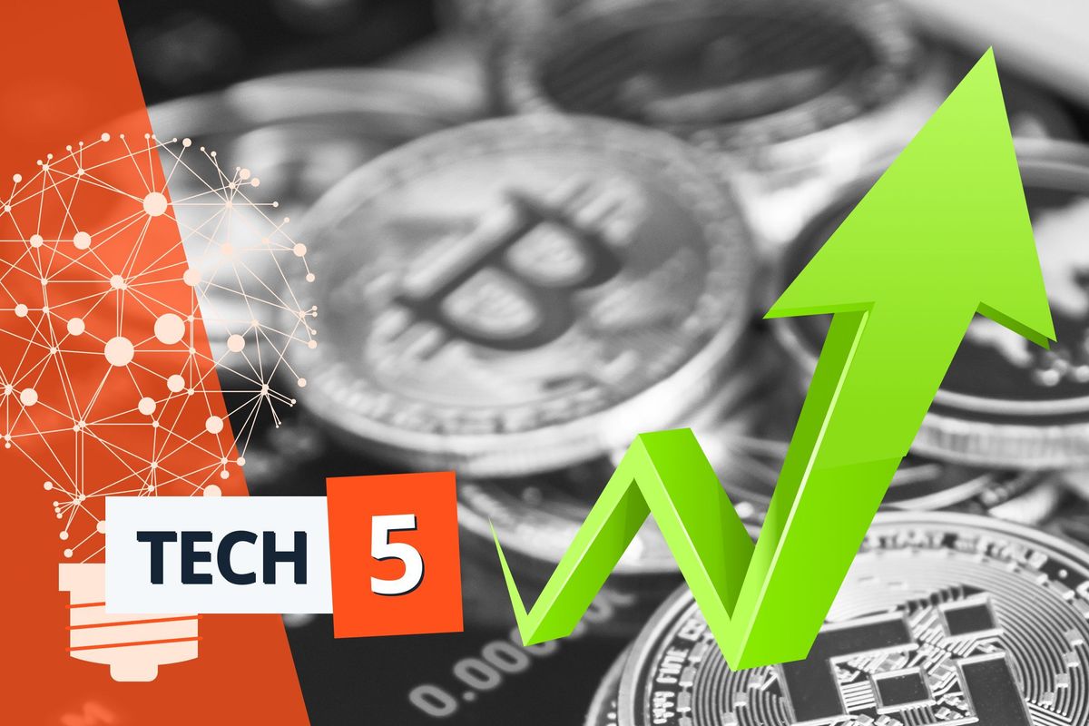 Silver-colored Bitcoins with green arrow pointing up.