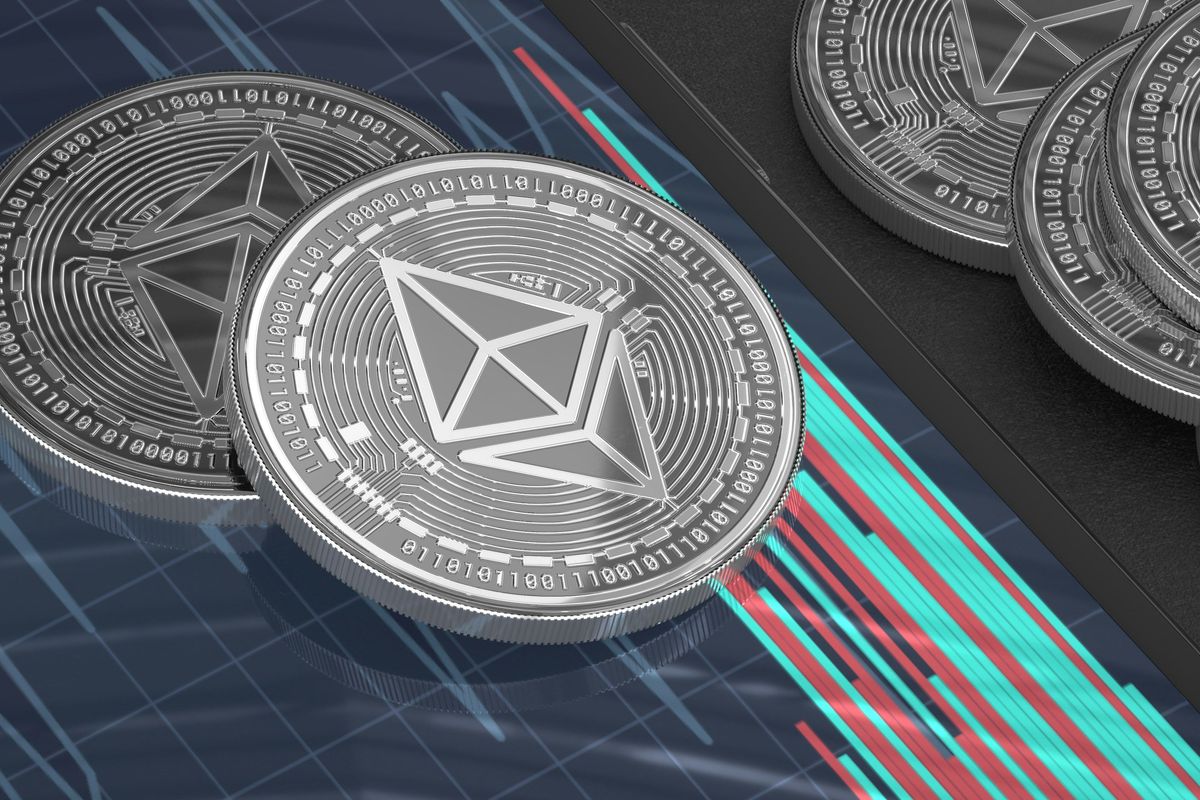 Silver Ethereum coins on a digital stock chart background.