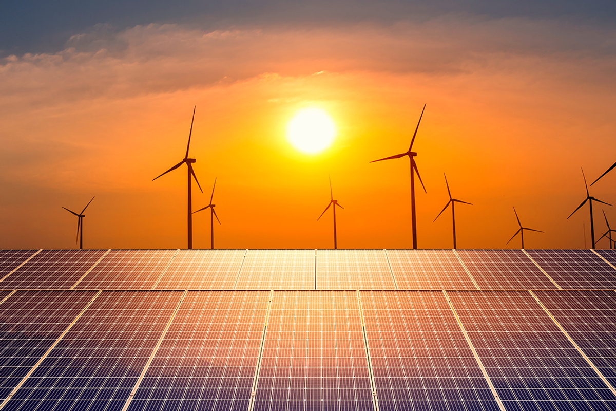 Solar panels with wind turbine farm.