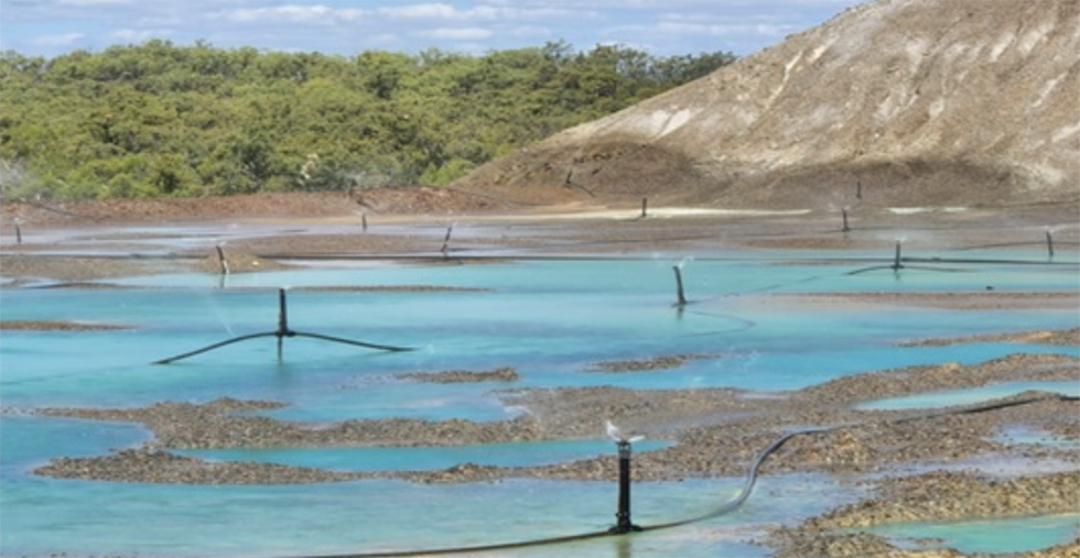 Sprinklers on the lower heap at Tartana Minerals' project.