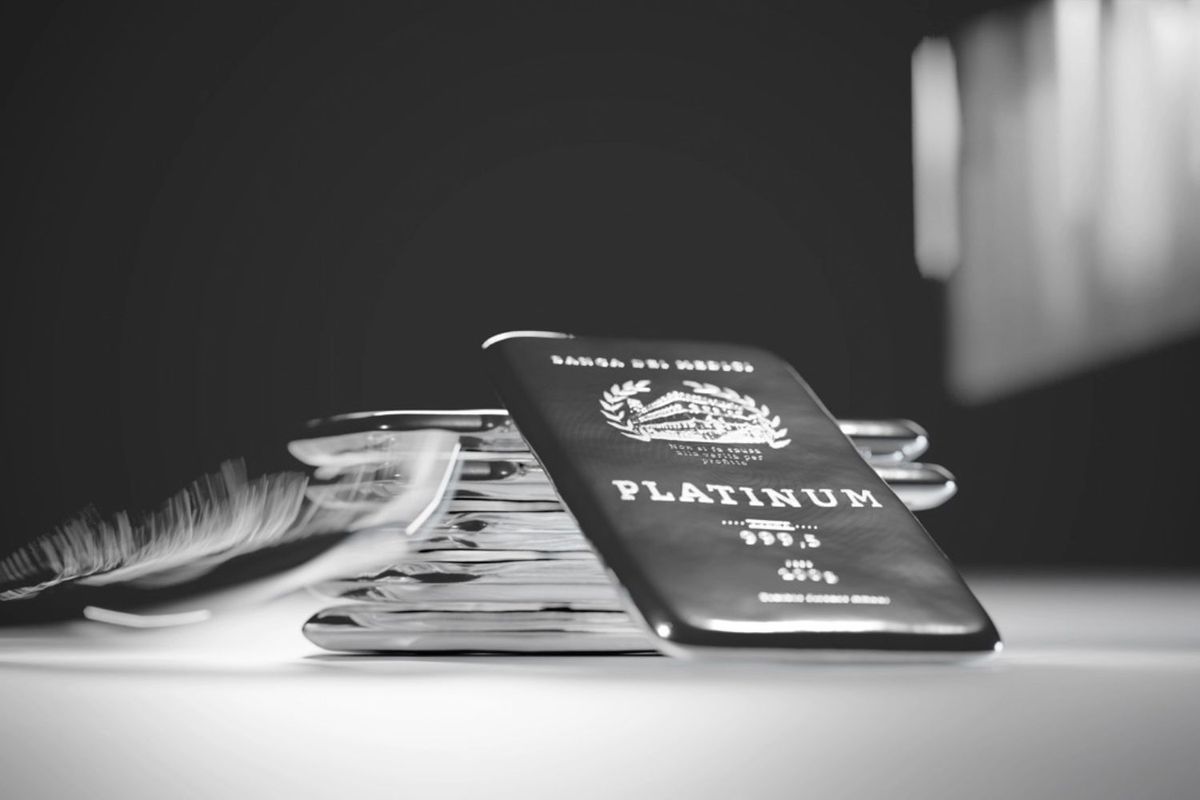 Stacked platinum bars with blurred movement effect.