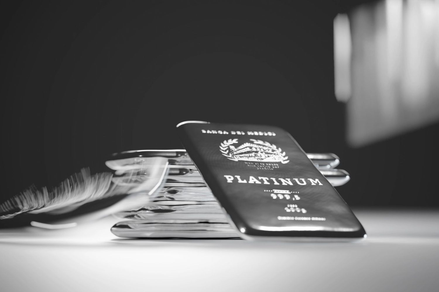 Stacked platinum bars with blurred movement effect.