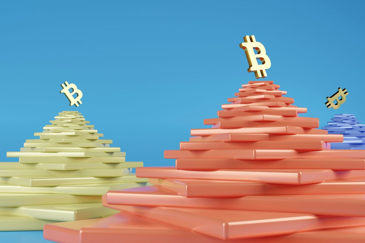 Stacks of colored rectangles with Bitcoin symbols on top.