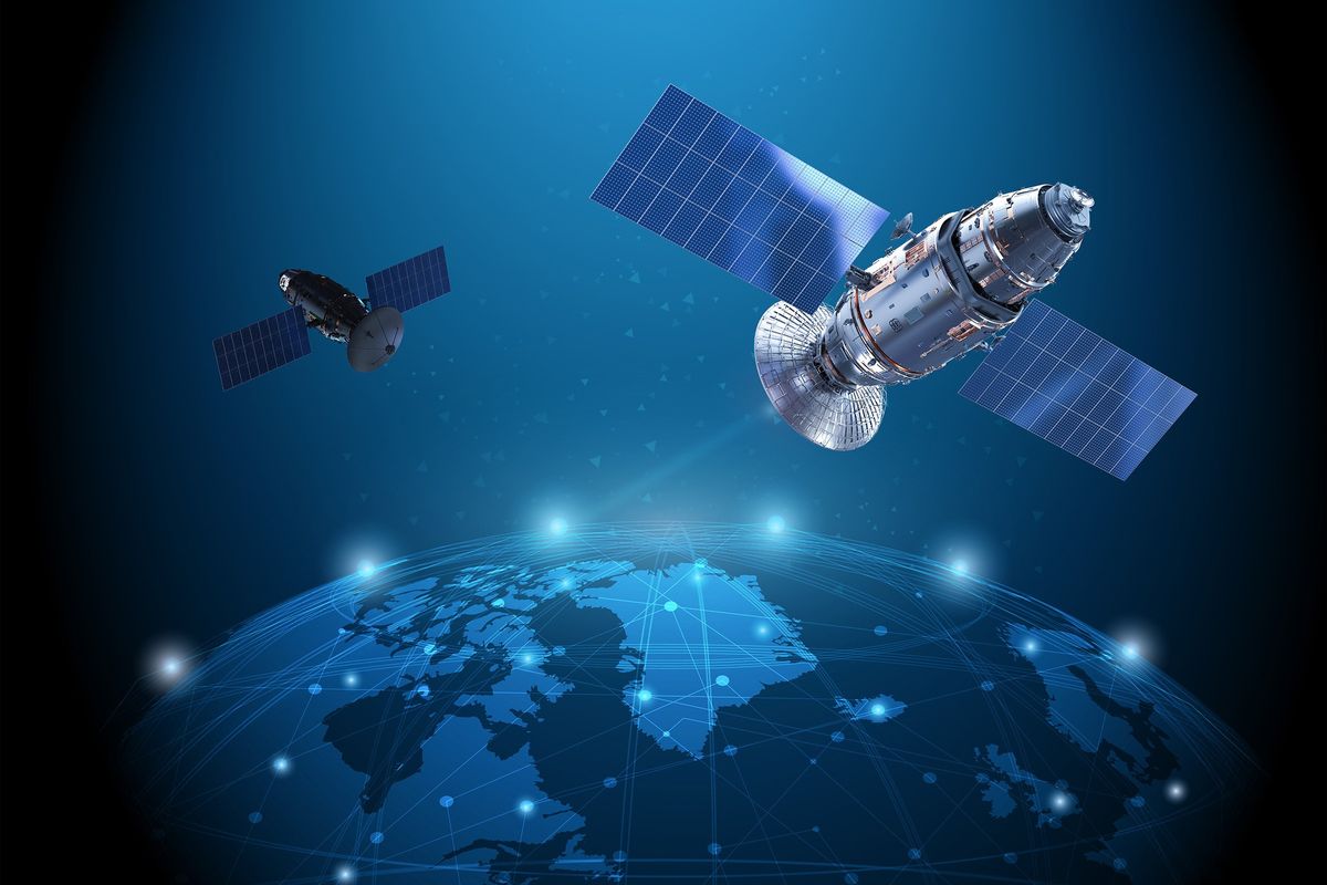 Starlink satellites hovering over telecommunications network.
