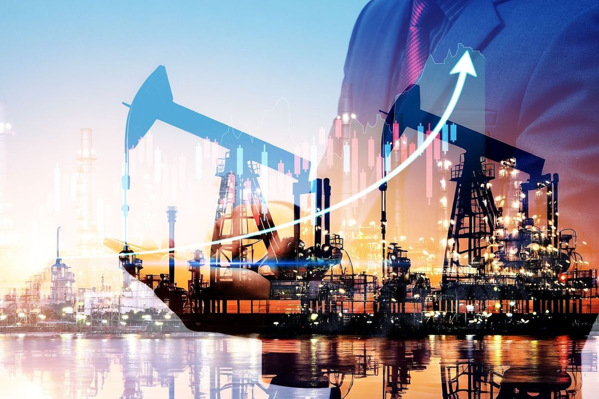 Stock chart over oil rig.