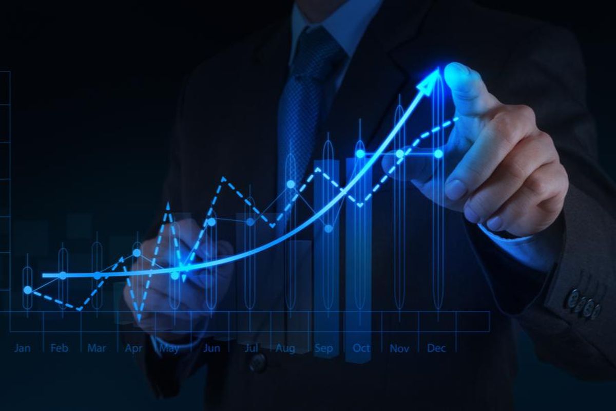 stock chart rising, person points to the top of the arrow